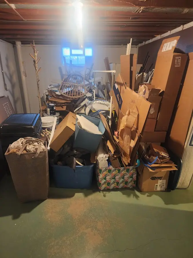 Roll-off dumpster container at job site for 2 Yard Dumpster Rental in Orchard Park